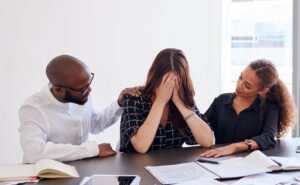 A homeowner being consoled by Consumer Advocacy Law Group after dealing with a stressful solar contract. 